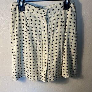For love and lemons black heart skirt with buttons down the front.